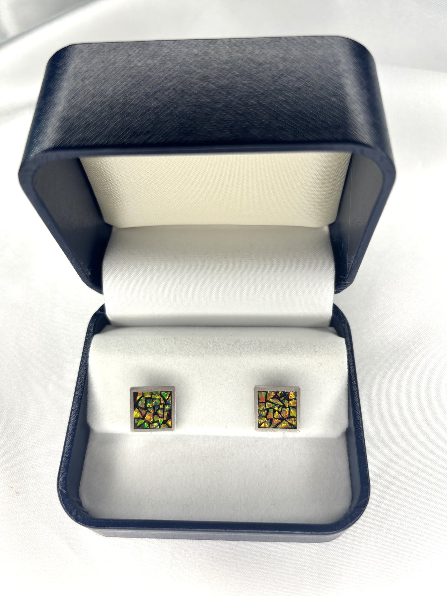 ADUSTAM cufflinks window